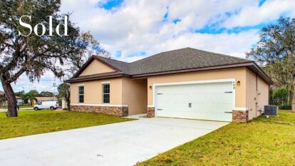 409 MANITOBA LN, POINCIANA, FL 34759